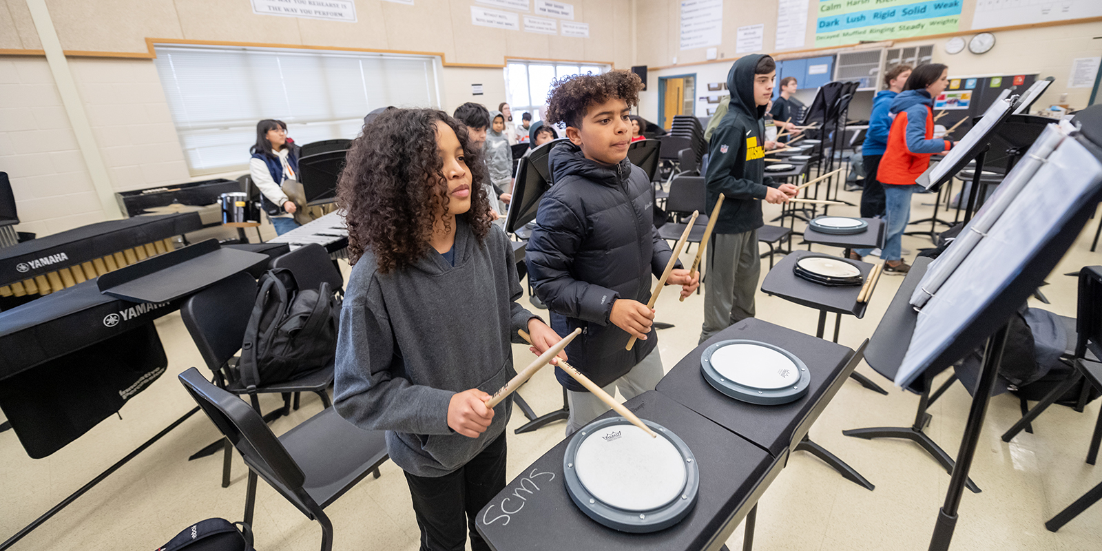 Students playing instruments