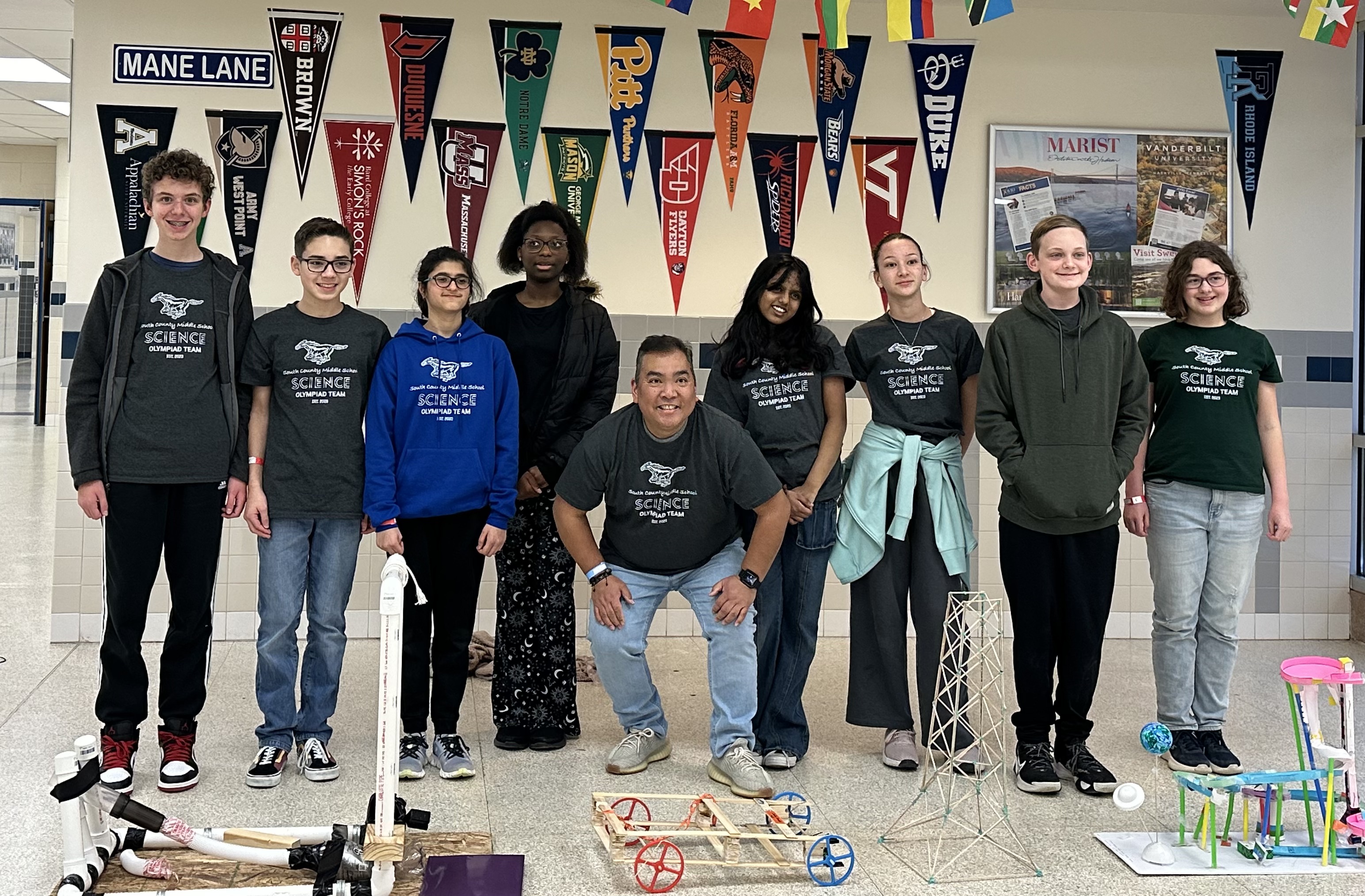 Students and teacher standing